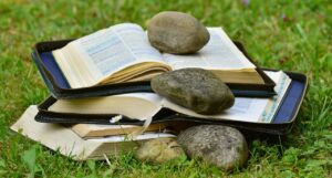 a book, bible, pitched, read, christian literature, holy scripture, book page, paper, faith, stumbling blocks, stack, stumbling blocks, stumbling blocks, stumbling blocks, stumbling blocks, stumbling blocks